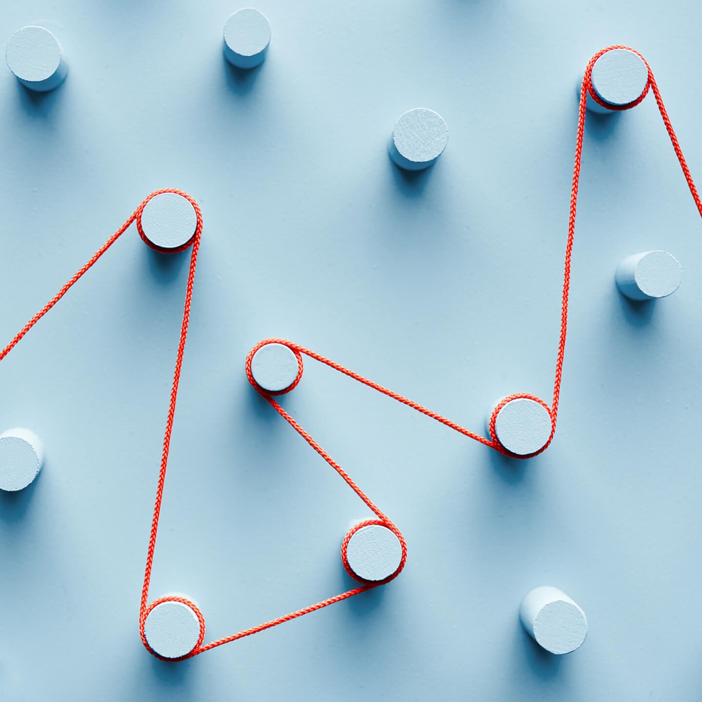 Orange thread ties around various circles